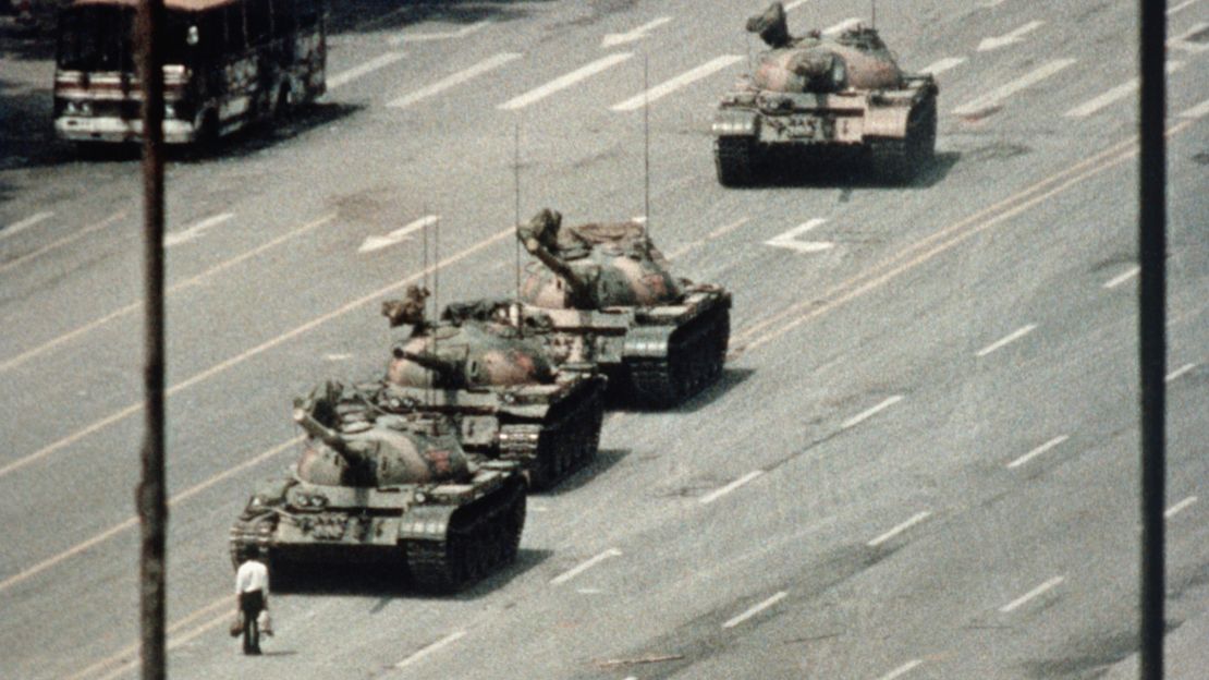 An anonymous demonstrator blocks the path of a tank convoy in Tiananmen Square during student protests in China in 1989.
