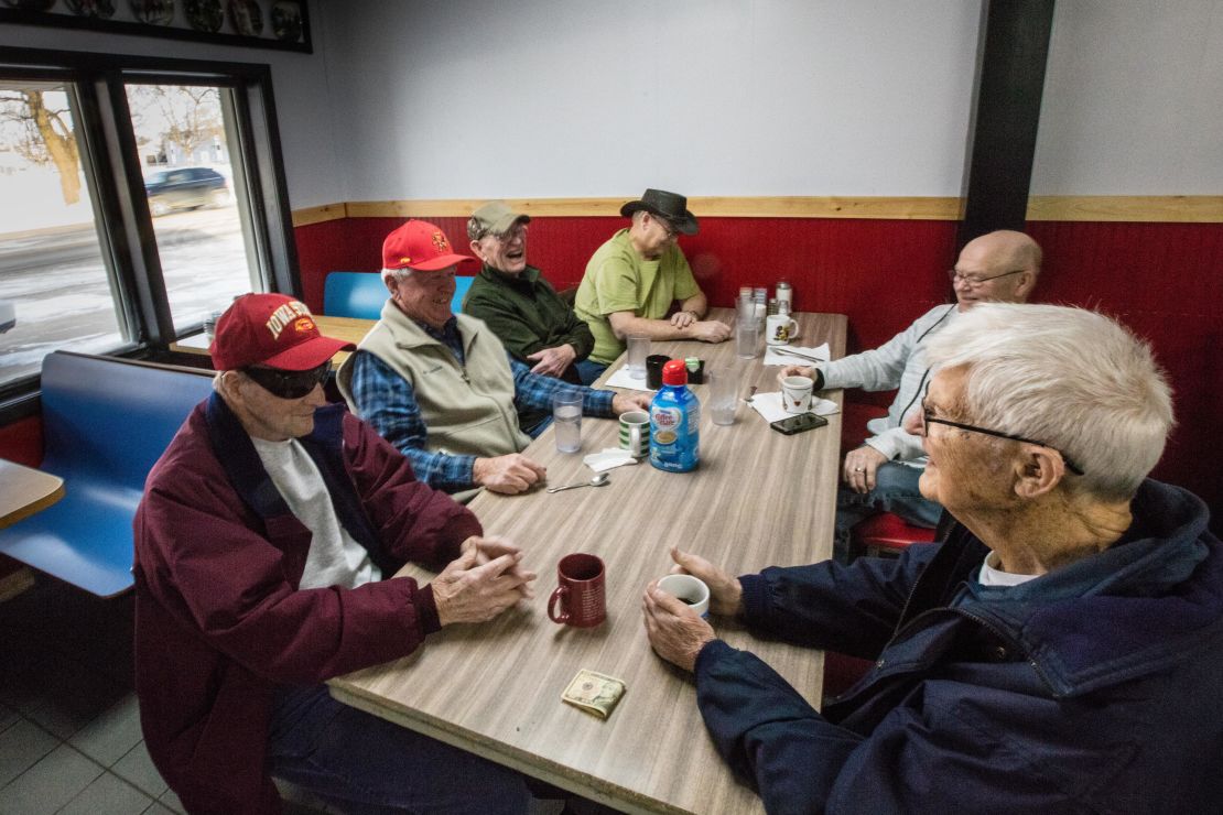 Neighbors in Monticello, Iowa, including Mel Manternach second from left, gather at Darrell's Diner to debate the politics of the day.