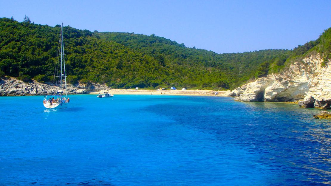 The water is iridescent at Voutoumi beach on the island of Antipaxos.