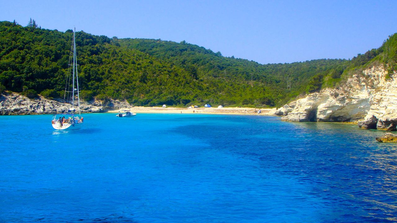 The water is iridescent at Voutoumi beach on the island of Antipaxos. 
