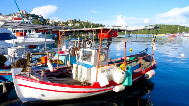 <strong>Small town charm:</strong> Sivota is a small fishing village with a pleasant promenade, tiny center and an impressive setting snuggled into the green hillsides. The area is dotted with stunning beaches and islets, perfect for exploring by boat. 