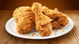 crispy kentucky fried chicken in a wooden table; Shutterstock ID 368008064; Job: -