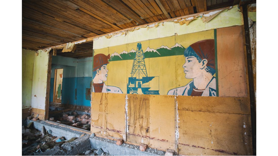 <strong>Living history: </strong>Broekkamp wanted to incorporate history into his photographs and depict how it still impacts life today. Here, he captures an old mural on a building in Inylchek.
