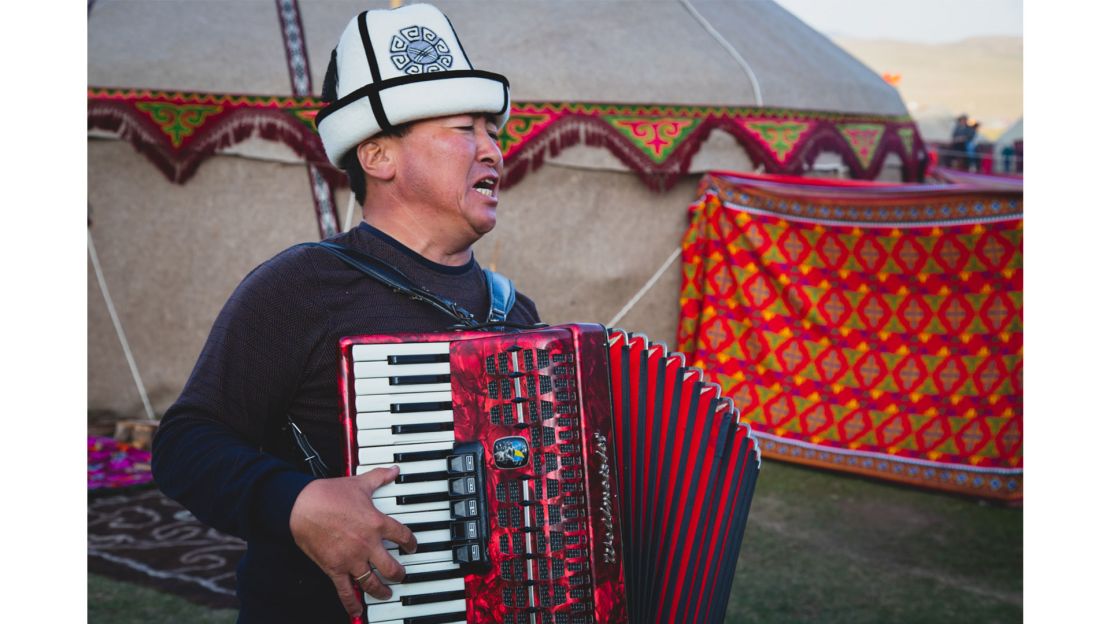 A member of the Munduz tribe in Kyrgyzstan, performing on the accordion. 