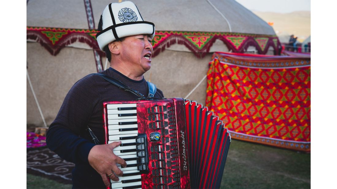 <strong>Challenge expectations</strong>: "Everybody [at home] would say to me: 'Oh, isn't it really dangerous there?'" he says. 'Why would people assume that? They don't even know anything about those countries." This is a member of the Munduz tribe in Kyrgyzstan, performing on the accordion.