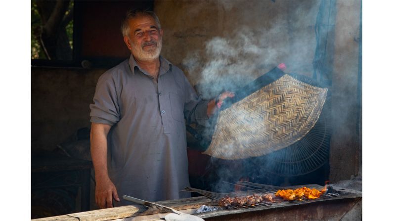 <strong>Foodie delights: </strong>Broekkamp took this photograph of a man in Afghanistan, cooking a kebab. 