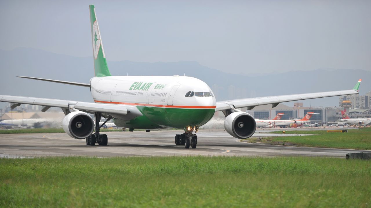 An EVA Air flight takes off from Sungshan airport in Taipei on October 31, 2010.