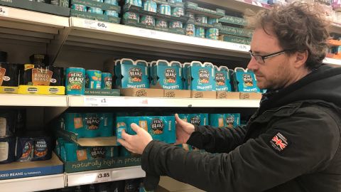 Graham Hughes stockpiles Heinz baked beans for his family at the supermarket.