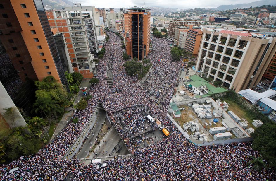 Opposition supporters in Caracas protest Maduro on January 23.