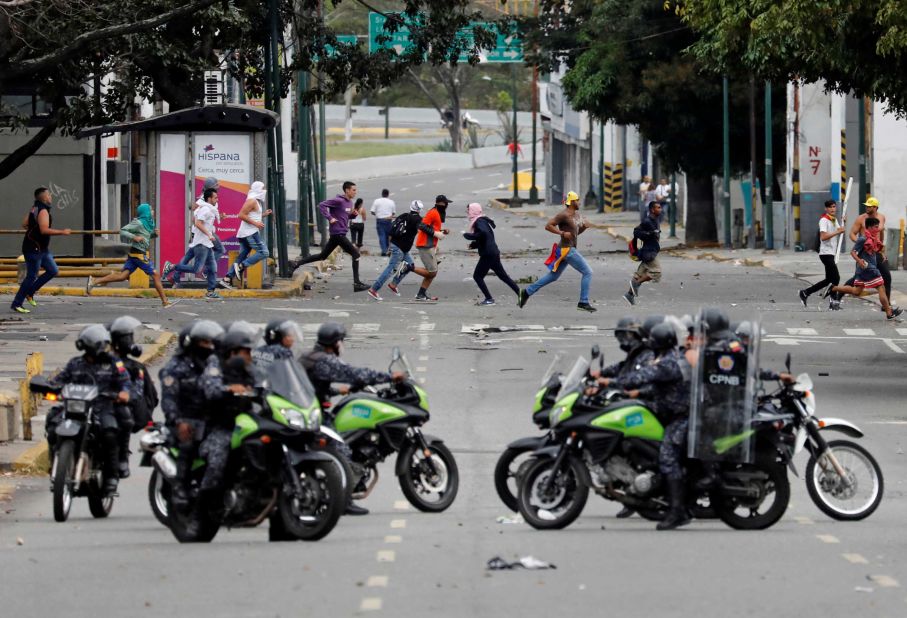 Police secure an area in Caracas on January 23.