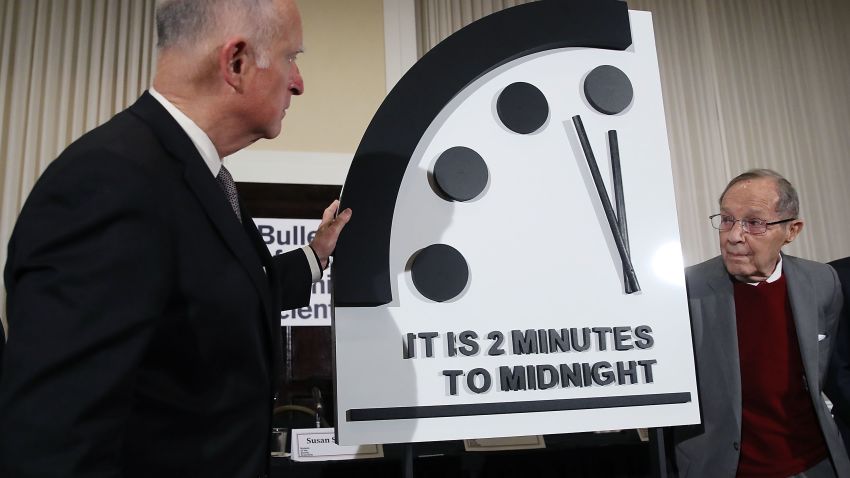 WASHINGTON, DC - JANUARY 24:  Former California Governor Jerry Brown, (L) and former U.S. Secretary of Defense William Perry unveil the Doomsday Clock during The Bulletin of the Atomic Scientists news conference, on January 24, 2019 in Washington, DC.  This year the Doomsday Clock remains unchanged and is set at two minutes to Midnight.  (Photo by Mark Wilson/Getty Images)