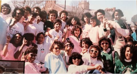 Photo of the 38 line sisters, taken in Spring 1986 on The Yard at Howard University. Harris is in the back row, fourth from the left