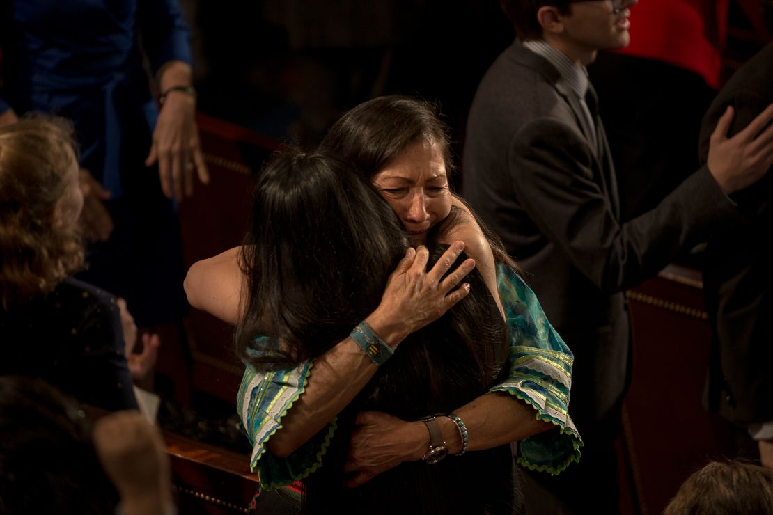 Rep. Haaland embraces fellow Native American Rep. Sharice Davids of Kansas after the swearing in of the 116th Congress.