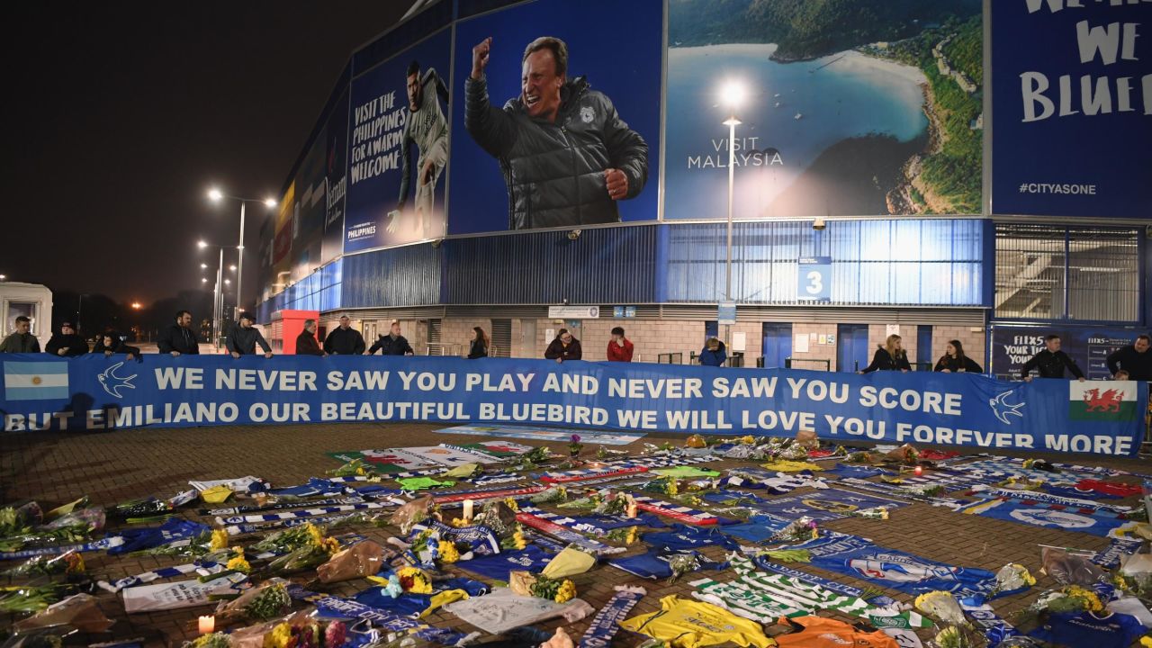 On January 24, Cardiff fans unveil a flag in front of tributes for Sala 