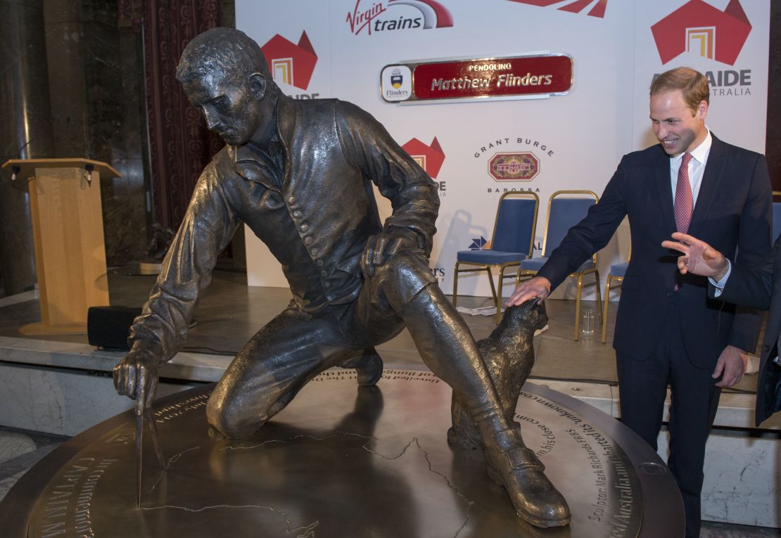 The UK's Prince William unveils a statute in honour of Matthew Flinders, the first cartographer to circumnavigate Australia and identify it as a continent at Australia House in 2014.