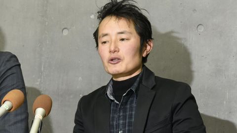 Takakito Usui speaks to reporters after the Supreme Court ruled a law that effectively forces trans people to be sterilized is "currently constitutional." The 45-year-old wished to register as a male without undergoing surgery.