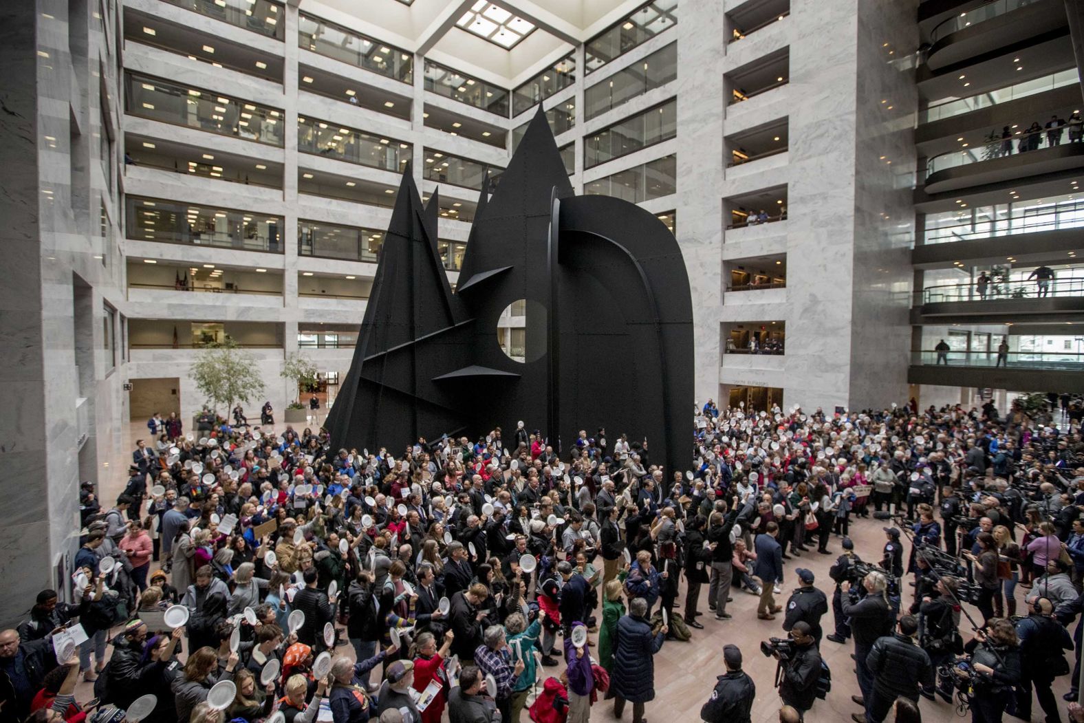 Furloughed government workers hold a silent protest on Capitol Hill on January 23.