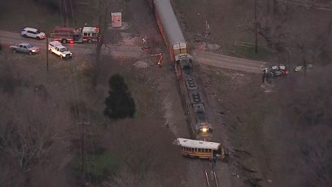 After the collision, the train pushed the school bus down the track.