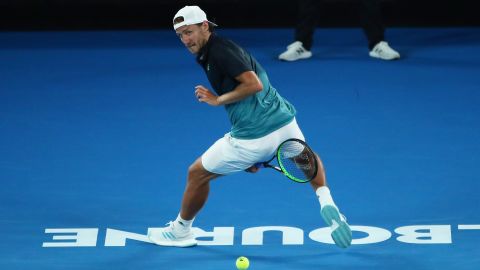 Lucas Pouille hits a tweener during his loss to Novak Djokovic in Melbourne. 
