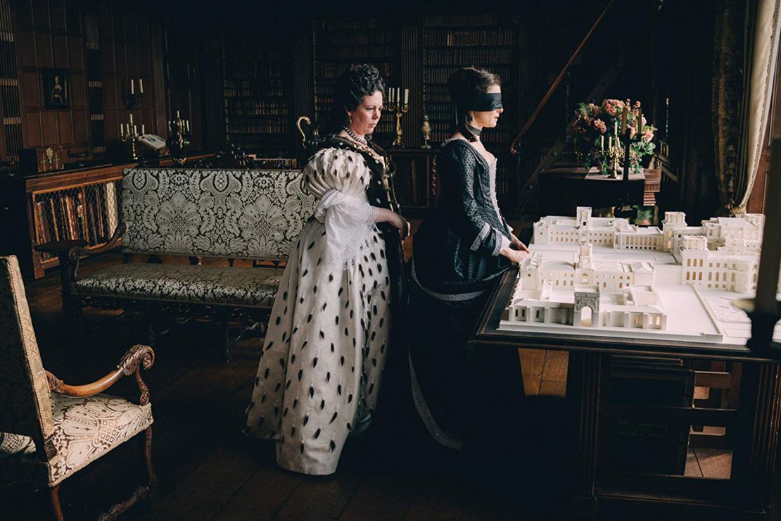 Queen Anne (Olivia Colman) surprises Sarah Churchill (Rachel Weisz) with a model of Blenheim Palace in "The Favourite."