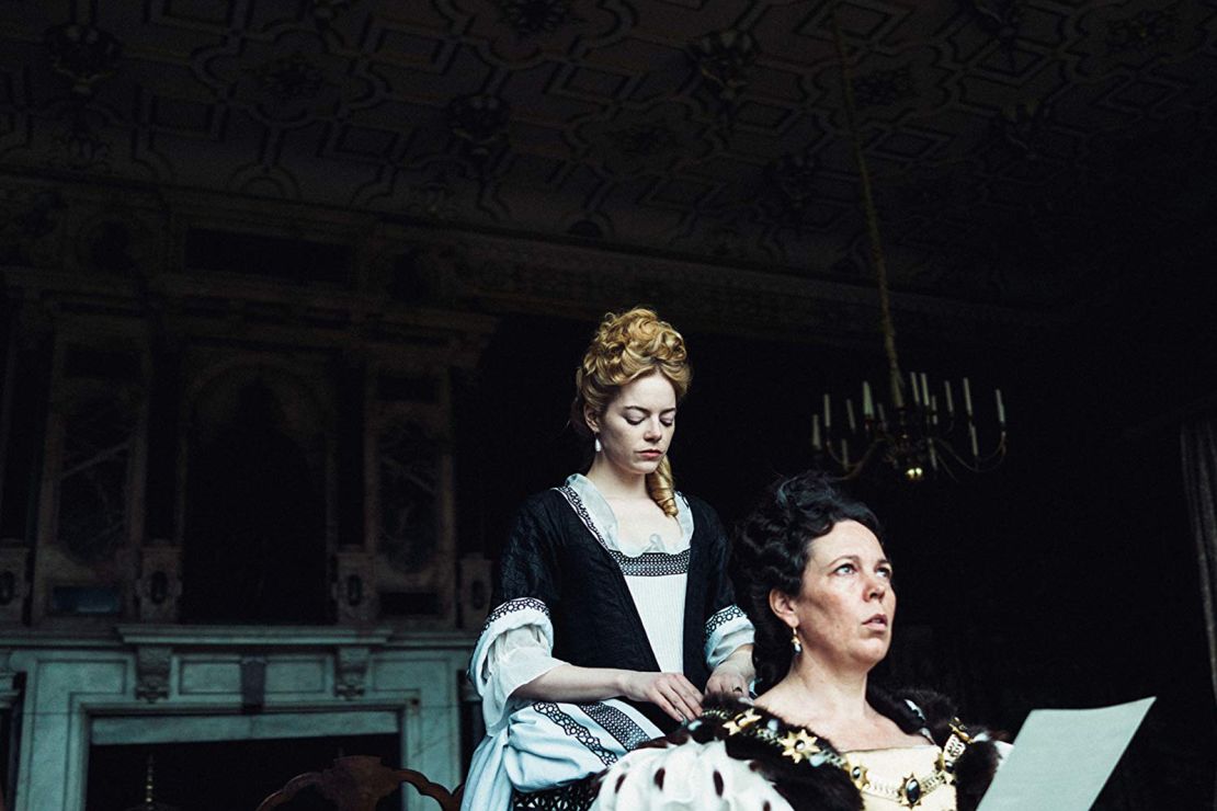 Emma Stone, playing Abigail Masham, and Olivia Coleman, who plays Queen Anne in "The Favourite."