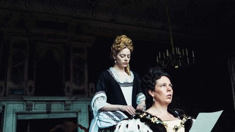 Emma Stone, playing Abigail Masham, and Olivia Coleman, who plays Queen Anne in "The Favourite."