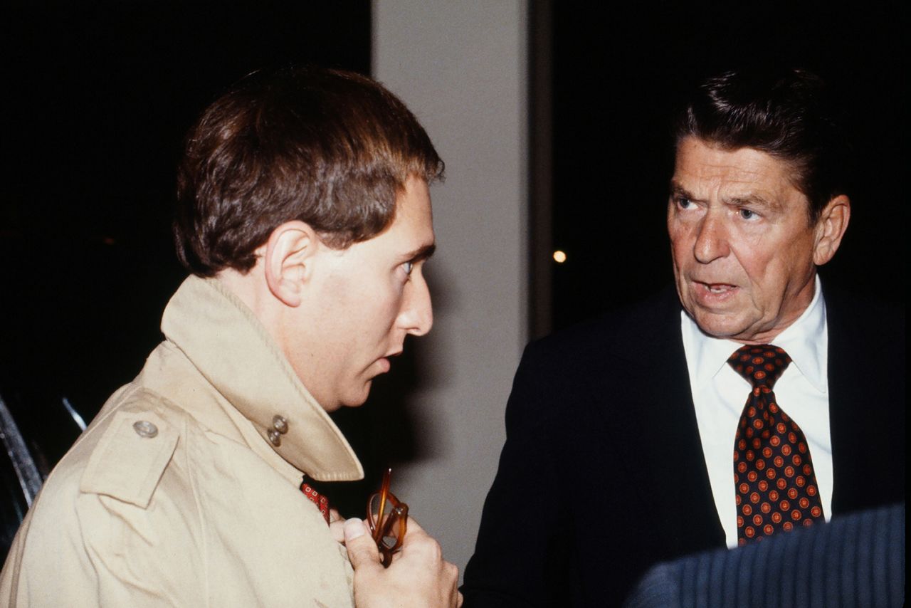 Stone, with then-presidential candidate Ronald Reagan, visits a Chrysler plant in Detroit in September 1980.