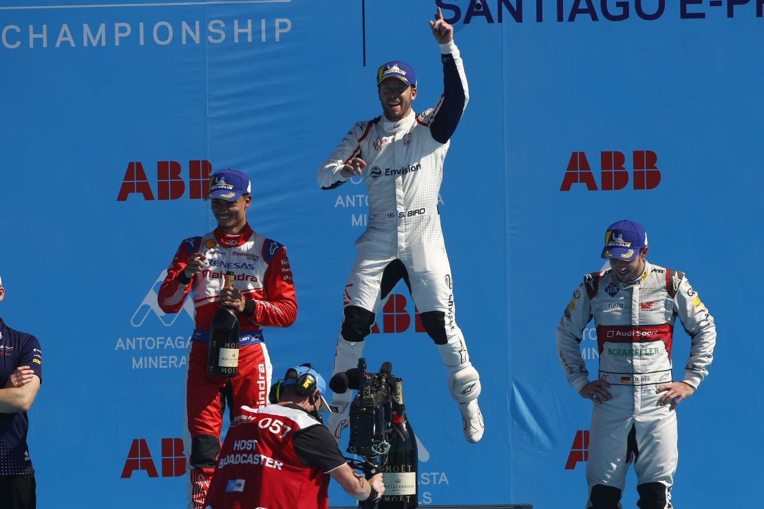 Sam Bird celebrates his victory on the podium in Mexico.