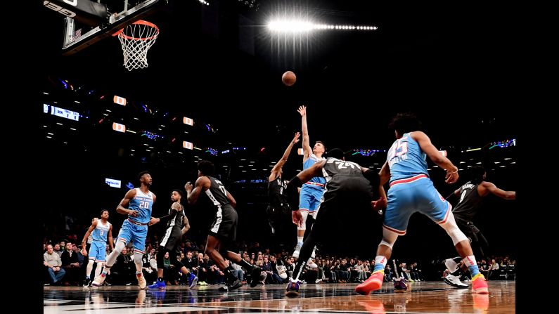 Sacramento's Bogdan Bogdanovic shoots a floater in the lane during an NBA game against Brooklyn on Monday, January 21.