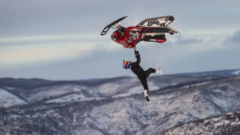 Daniel Bodin soars through the air on his way to winning the Snowmobile Freestyle event at the Winter X Games on Friday, January 25.