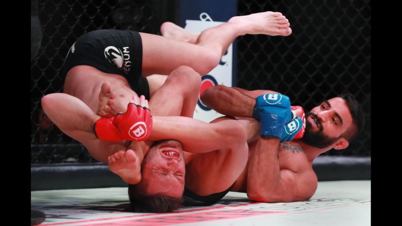 Adel Altamimi, right, wraps up Brandon McMahon during Bellator 214 on Saturday, January 26. Altamimi won his debut fight by first-round submission.