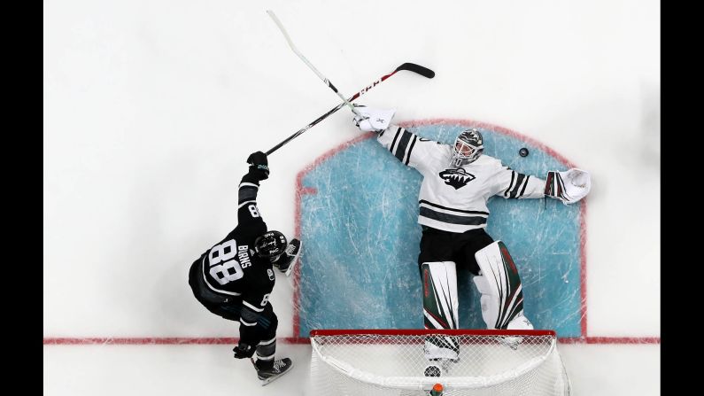 Minnesota goalie Devan Dubnyk sprawls out to make a save during the NHL All-Star Game on Saturday, January 26.