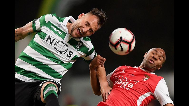 Sporting's Nemanja Gudelj, left, and SC Braga's Wilson Eduardo compete for a header during a League Cup semifinal in Braga, Portugal, on Wednesday, January 23. Sporting advanced to the final on penalties.