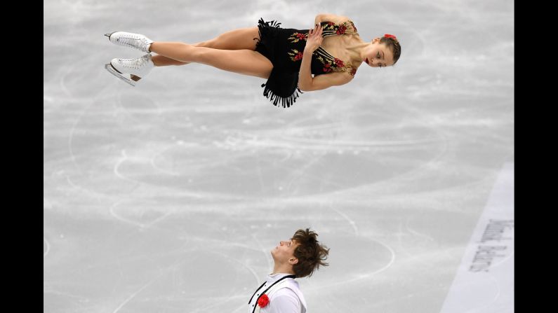 Russian figure skater Aleksandra Boikova spins in the air as she and Dmitrii Kozlovskii perform at the European Championships on Wednesday, January 23. They won the bronze.