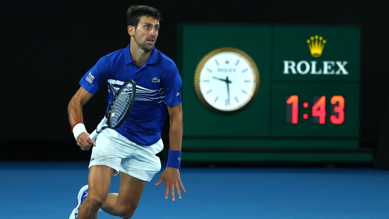 Novak Djokovic chases a ball against Rafael Nadal in Melbourne. 