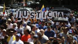 CARACAS, VENEZUELA - JANUARY 26: Hundreds of people demand justice as part of a demostration in support of Juan Guaido self-proclaimed interim President of Venezuela on January 26, 2019 in Caracas, Venezuela. Opposition leader Juan Guido has self-proclaimed as interim President of Venezuela against Nicolas Maduro's government. Many world leaders have expressed their support for Guaido this week while others stand behind Maduro. (Photo by Marco Bello/Getty Images)