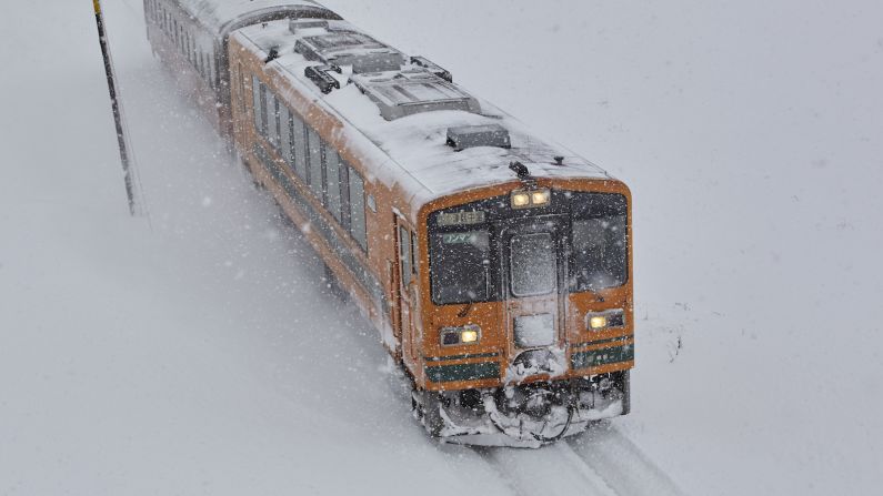 <strong>Tsugaru Railways Stove Train: </strong>Every winter, this classic "stove train," operated by Japan's Tsugaru Railway Line, chugs through a snow-covered stretch of farmland in Aomori Prefecture's remote Tsugaru Peninsula.