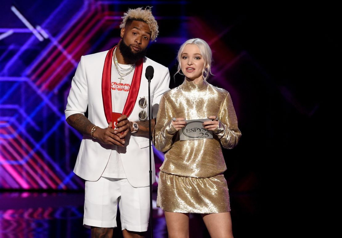Beckham and actress Dove Cameron present an award at the 2017 ESPYS at Los Angeles' Microsoft Theater in July 2017.
