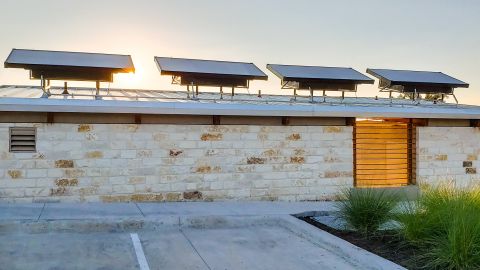 Zero Mass Water panels atop a building in a planned community in Austin, Texas.