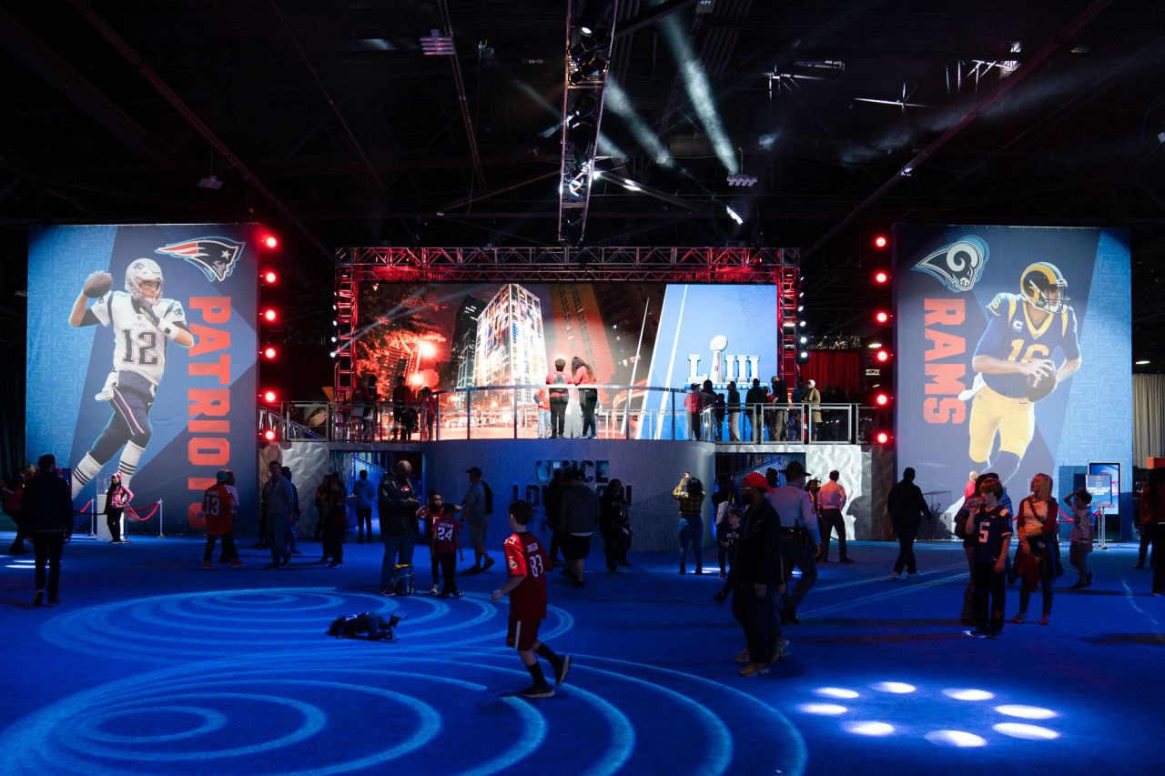 Visitors to the Super Bowl Experience in the Georgia World Congress Center check out the Vince Lombardi Trophy exhibit.