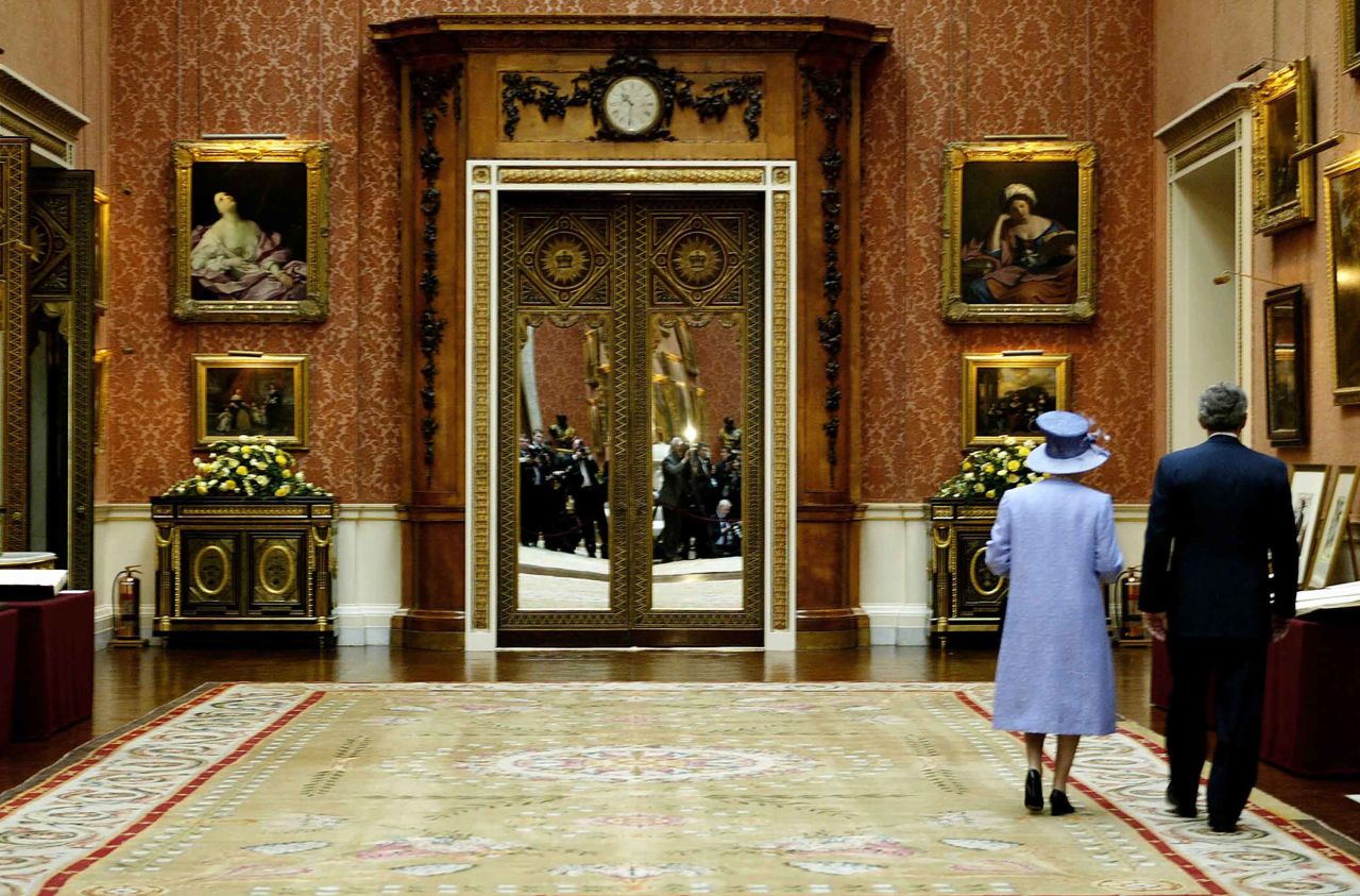 The Queen walks through the Queen's Gallery at Buckingham Palace with President George W. Bush during his 2003 state visit.