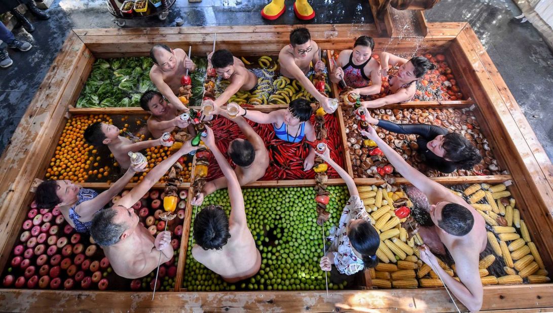 <strong>Human hot pot: </strong>A hotel in Hangzhou in China's Zhejiang province has designed its hot spring to look like a human hot pot -- complete with produce such as limes, chilies and apples.  