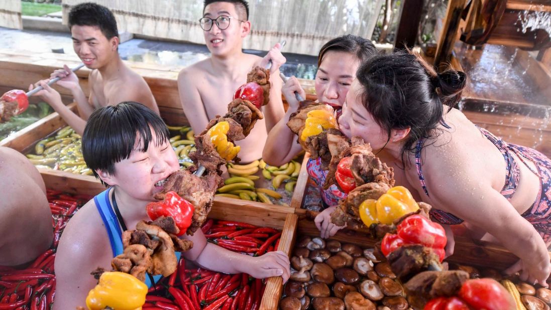<strong>Skewered meat:</strong> Hot pot dippers dine on skewered meats and veggies while they soak.  