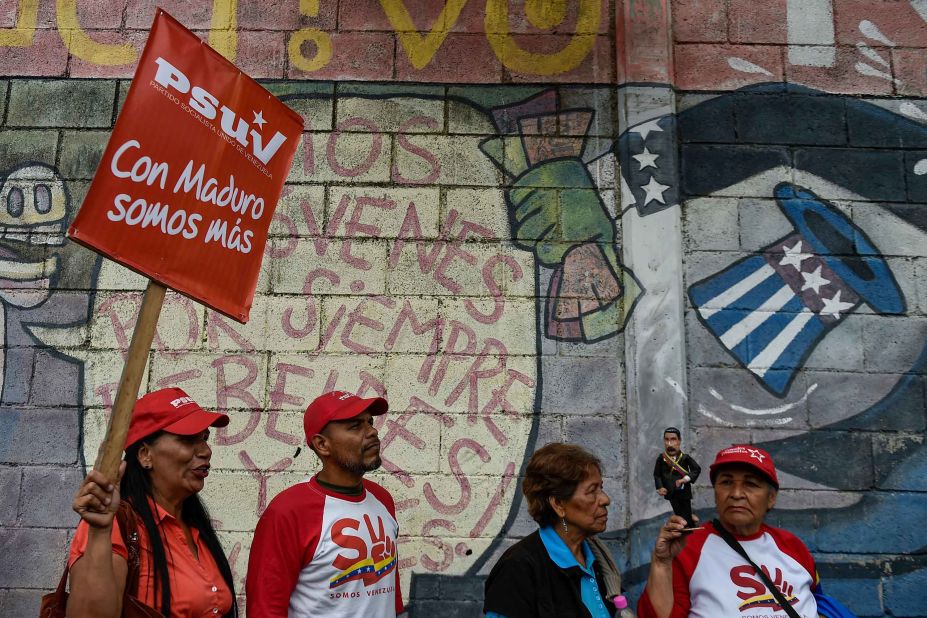 Government supporters in Caracas hold a rally in support of Maduro on January 26.