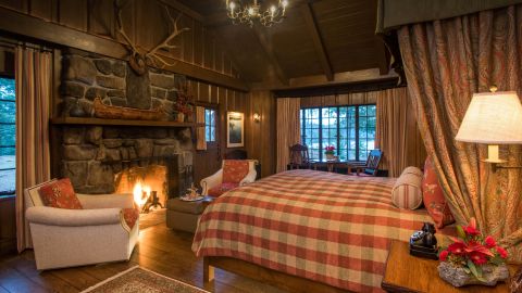 The 11 rooms at The Point, the former home of William Avery Rockefeller II, are spread across four log buildings, with guests allowed free range across the 75-acre spread on Lake Saranac.