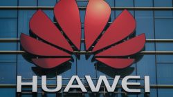 The Huawei logo stands on a Huawei office building in Dongguan in Chinas southern Guangdong province on December 18, 2018. (Photo by Nicolas ASFOURI / AFP)        (Photo credit should read NICOLAS ASFOURI/AFP/Getty Images)