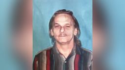 Dennis Tuttle was also killed during the raid, according to police. 