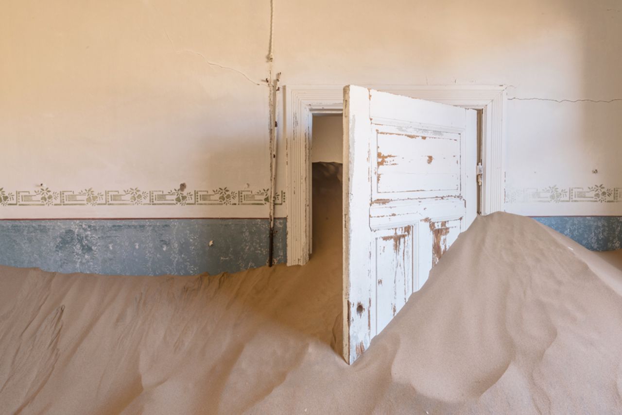 Veillon's series "Sands of Time" documents the fate of Kolmanskop, a former diamond-mining town in Namibia.