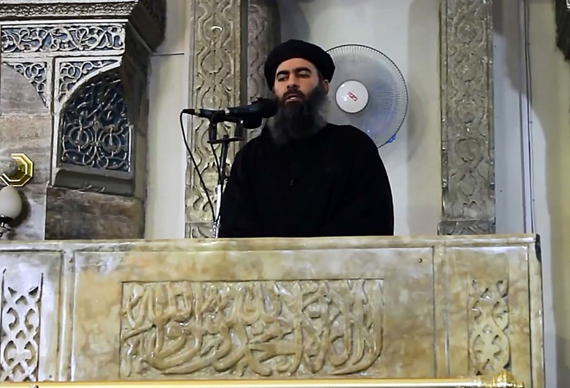 An image grab taken from a video released on July 5, 2014 by Al-Furqan Media shows alleged ISIS leader Abu Bakr al-Baghdadi preaching during Friday prayer at a mosque in Mosul.