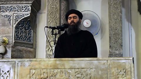 An image grab taken from a video released on July 5, 2014 by Al-Furqan Media shows alleged ISIS leader Abu Bakr al-Baghdadi preaching during Friday prayer at a mosque in Mosul.